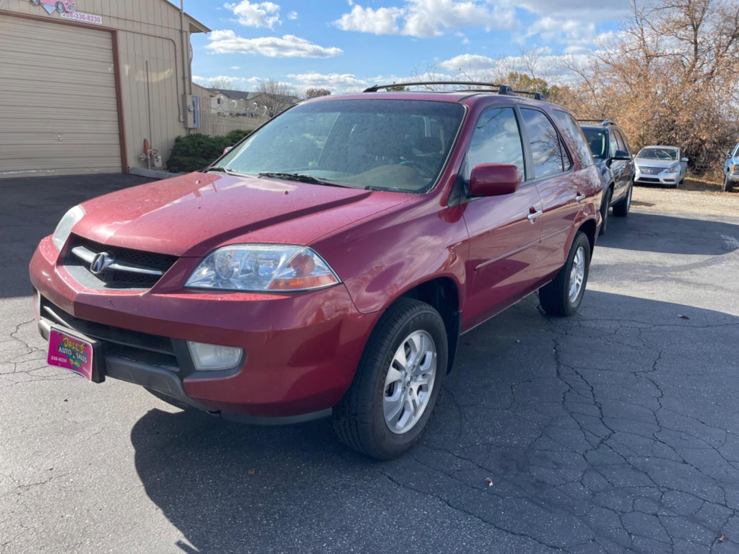 2003 Maroon /Tan Acura MDX Touring (2HNYD18923H) with an 3.5 V6 engine, AT transmission, located at 813 E Fairview Ave, Meridian , ID, 83642, (208) 336-8230, 43.618851, -116.384010 - Photo#2